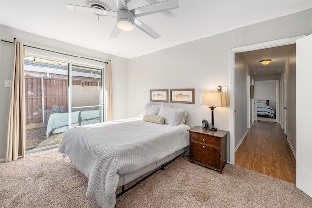 carpeted bedroom with access to outside and ceiling fan