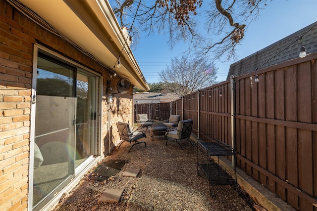 exterior space with an outdoor fire pit