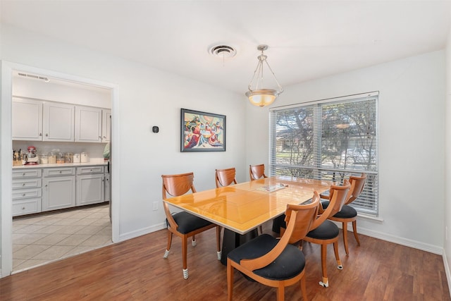 dining area featuring light hardwood / wood-style floors