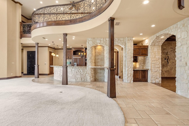 reception area featuring decorative columns