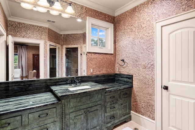 bathroom featuring vanity and ornamental molding