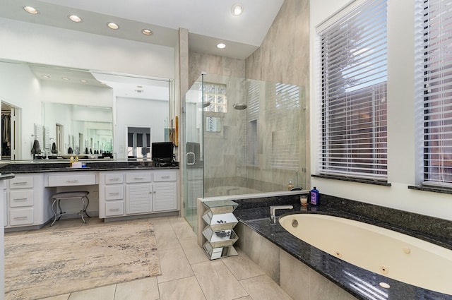 bathroom with vanity, tile patterned floors, and independent shower and bath