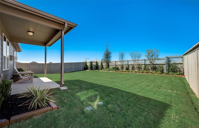 view of yard with a patio area