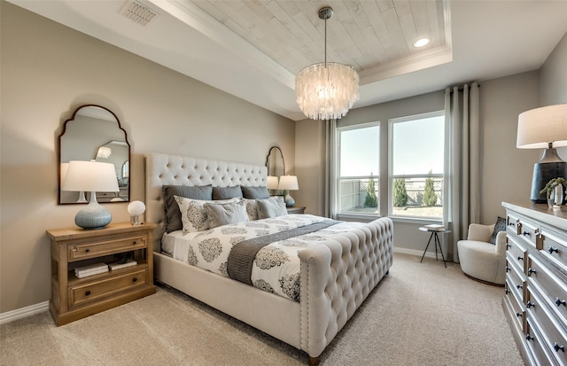 carpeted bedroom featuring wooden ceiling, a tray ceiling, and a notable chandelier