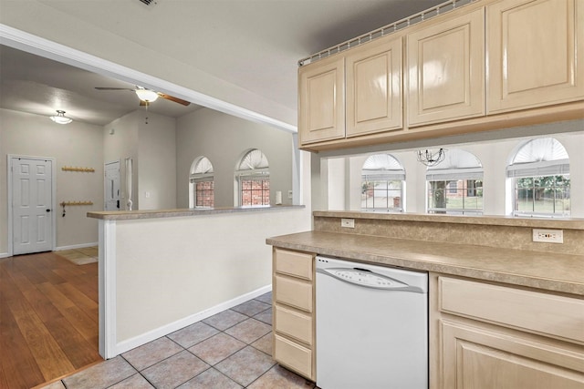 kitchen with ceiling fan, light tile patterned floors, and white dishwasher