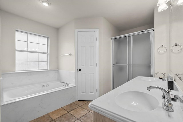 bathroom with vanity, independent shower and bath, and tile patterned flooring