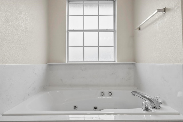 bathroom featuring a bathing tub