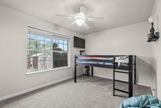 bedroom with multiple windows, carpet flooring, and ceiling fan