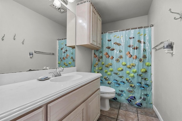 bathroom with vanity, curtained shower, tile patterned floors, and toilet