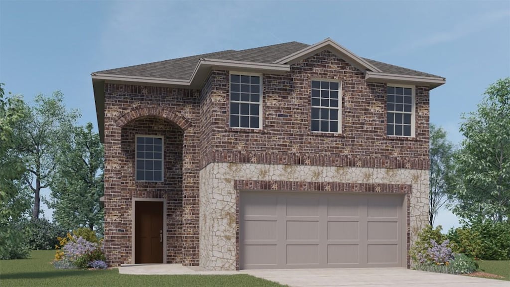 view of front of home with a garage