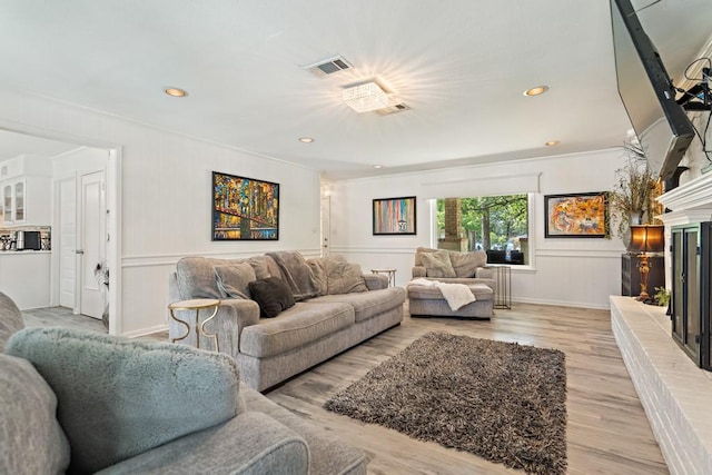 living room featuring light hardwood / wood-style floors