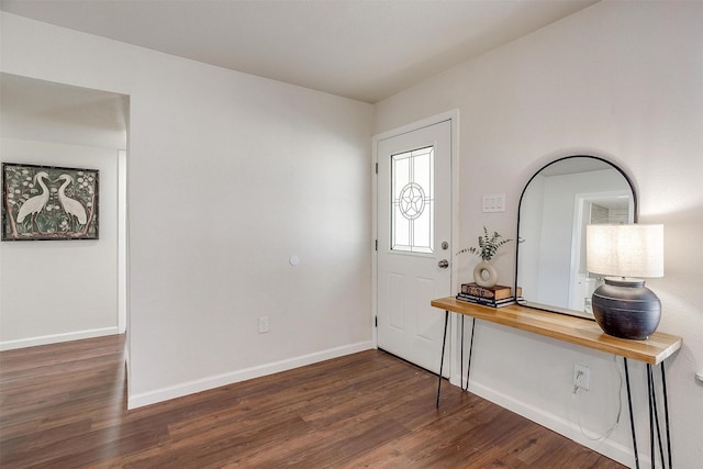 entrance foyer with dark hardwood / wood-style floors