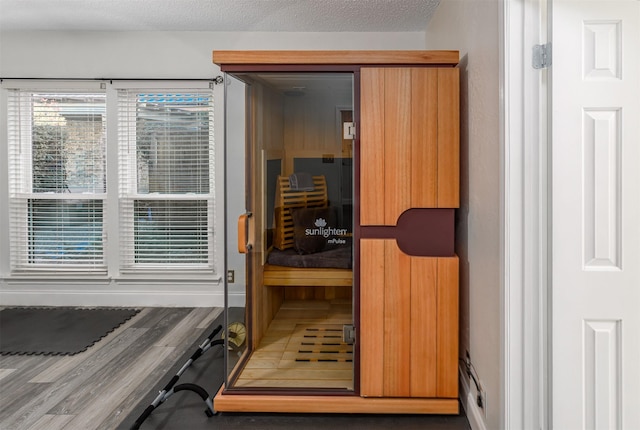 view of sauna / steam room with wood-type flooring