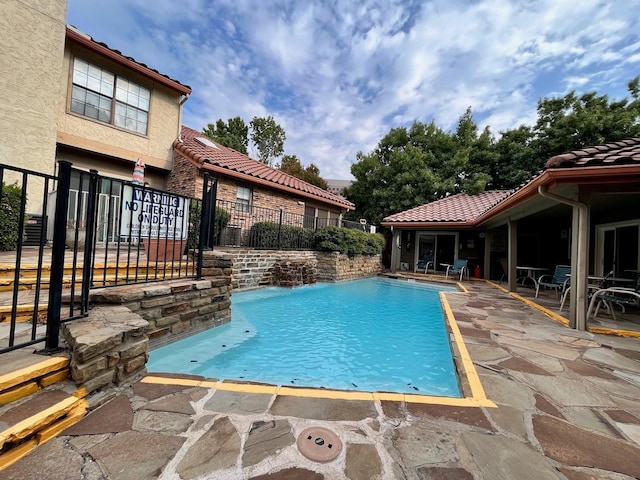 view of pool with a patio