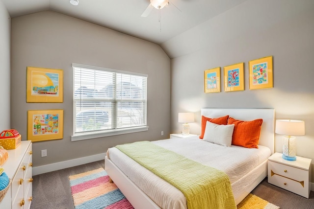 carpeted bedroom featuring vaulted ceiling, a ceiling fan, and baseboards