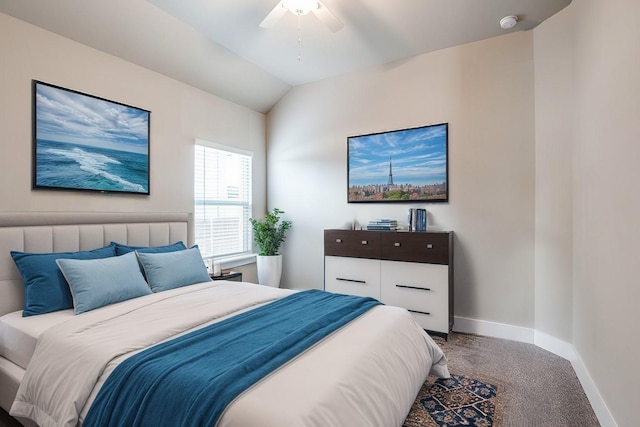 carpeted bedroom featuring ceiling fan, baseboards, and vaulted ceiling