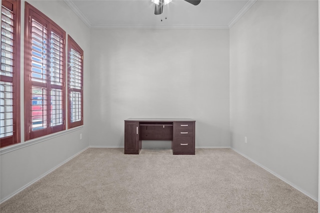 unfurnished room featuring ornamental molding, light colored carpet, and ceiling fan