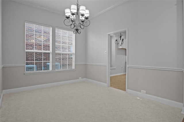 carpeted empty room featuring an inviting chandelier and crown molding