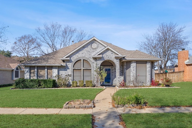 view of front of home with a front lawn