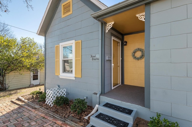 doorway to property with cooling unit