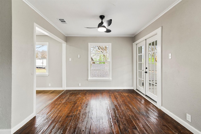 unfurnished dining area featuring dark wood-type flooring, ceiling fan, ornamental molding, and french doors