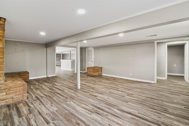 basement with wood-type flooring