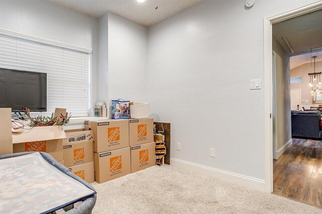 bedroom featuring dark carpet