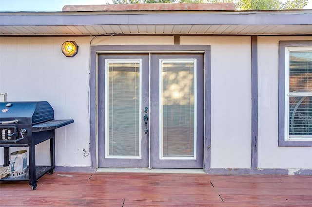 doorway to property with a wooden deck