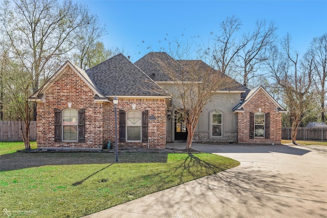 view of front of property with a front lawn