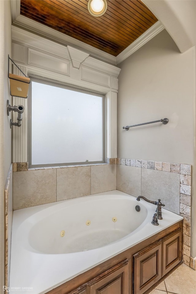 bathroom featuring wood ceiling, a bathtub, crown molding, and tile patterned flooring