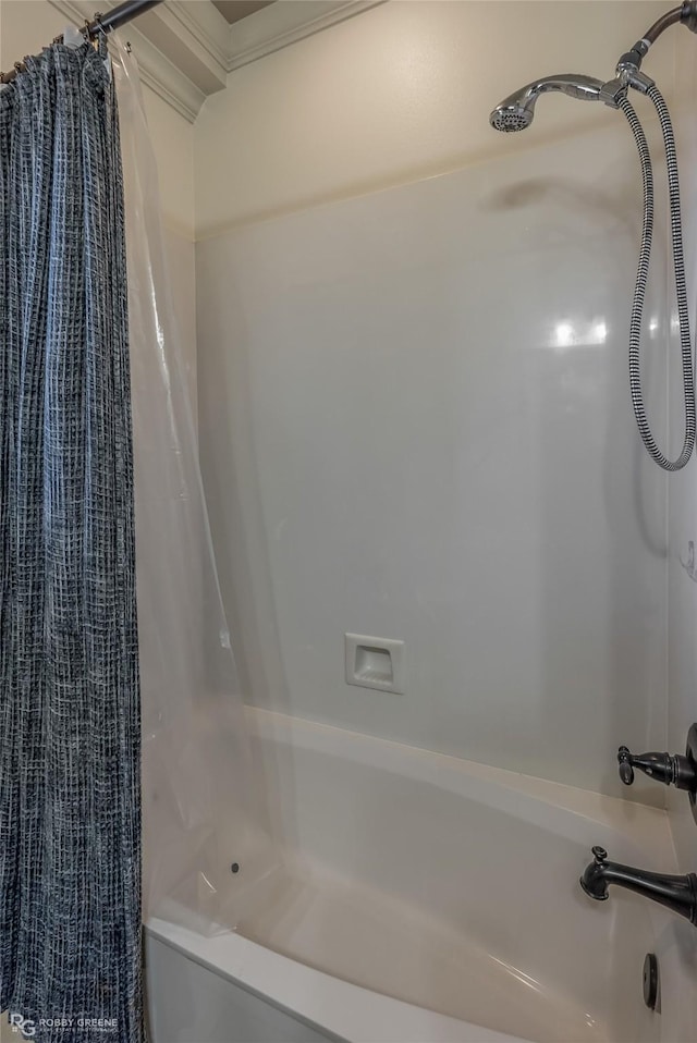 bathroom with shower / tub combo