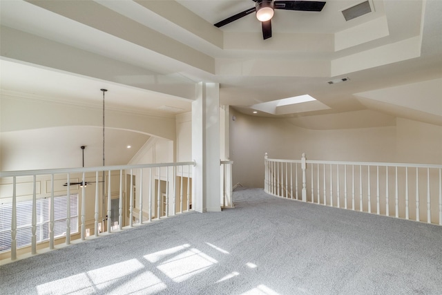 additional living space featuring carpet flooring and ceiling fan