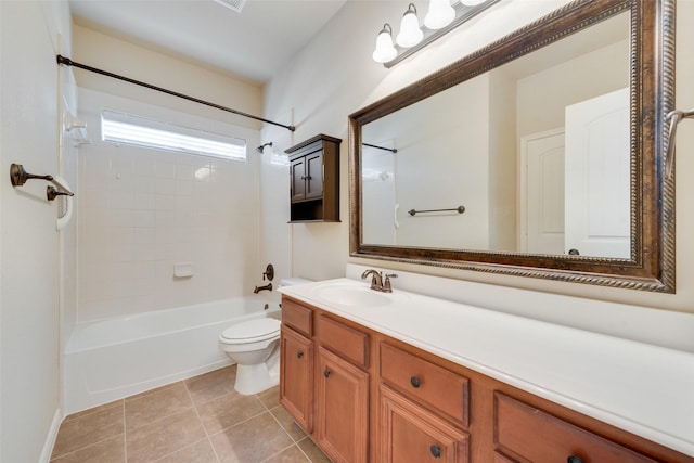 full bathroom with vanity, toilet, tile patterned floors, and tiled shower / bath