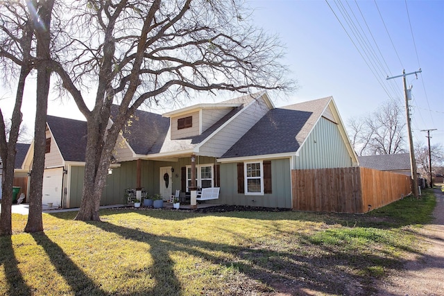 view of front of home featuring a front lawn and covered porch