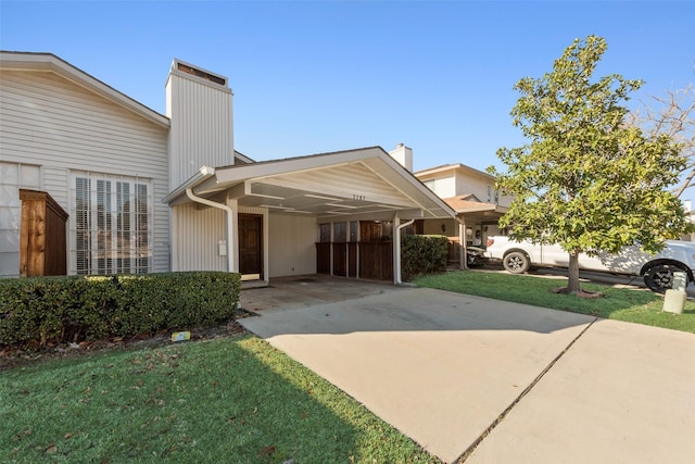 view of front of house featuring a carport