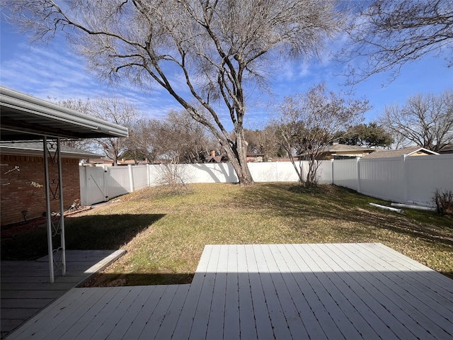 view of yard with a wooden deck