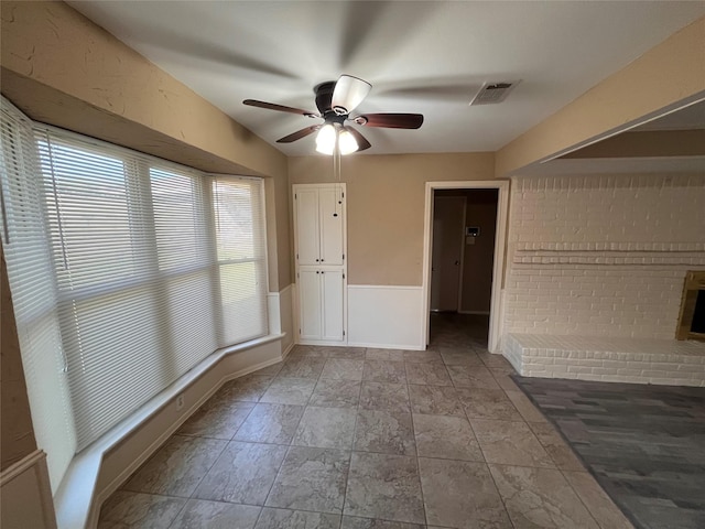 spare room featuring ceiling fan