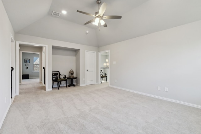 unfurnished bedroom with recessed lighting, light colored carpet, visible vents, baseboards, and vaulted ceiling