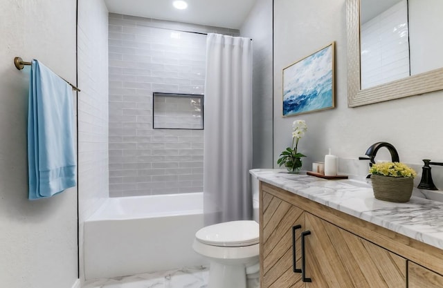 full bathroom featuring vanity, toilet, and shower / bath combo