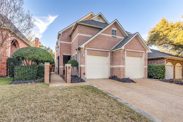 view of front of property featuring a front lawn and a garage