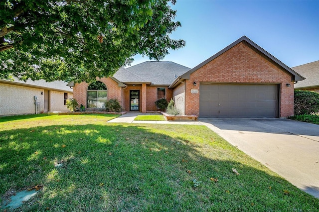 ranch-style home featuring a front yard and a garage