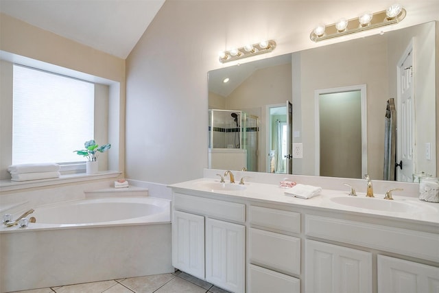 bathroom with separate shower and tub, tile patterned flooring, vanity, and lofted ceiling