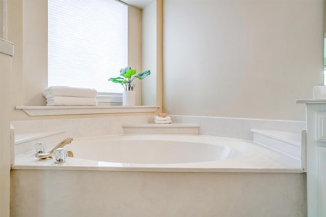 bathroom featuring a tub