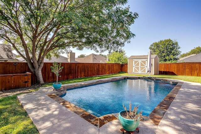 view of pool with a storage shed