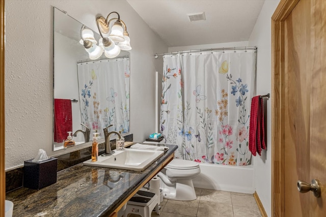 full bath featuring visible vents, toilet, shower / bath combo with shower curtain, tile patterned floors, and vanity