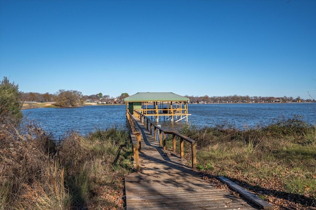 dock area featuring a water view