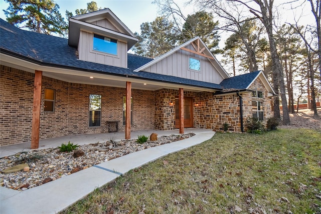 exterior space featuring a front lawn