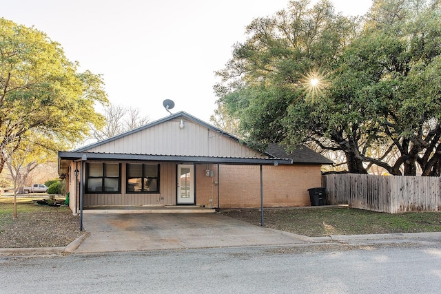 view of front facade with a carport