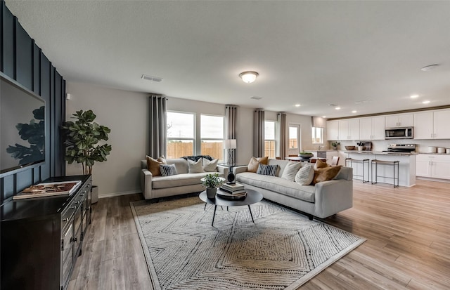 living room featuring light hardwood / wood-style flooring