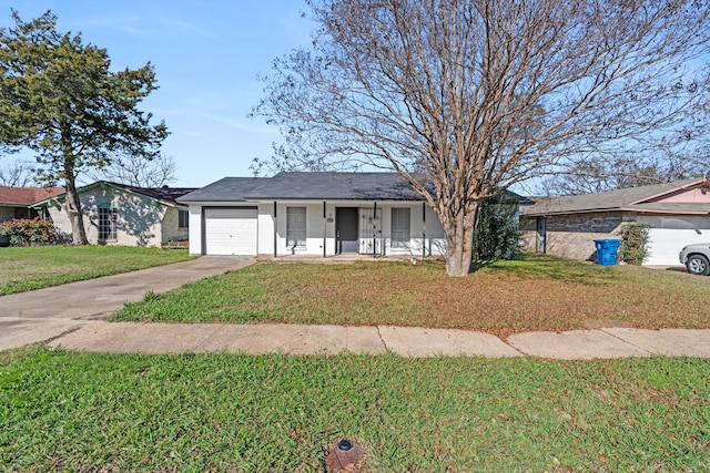 ranch-style home featuring a front lawn, covered porch, and a garage